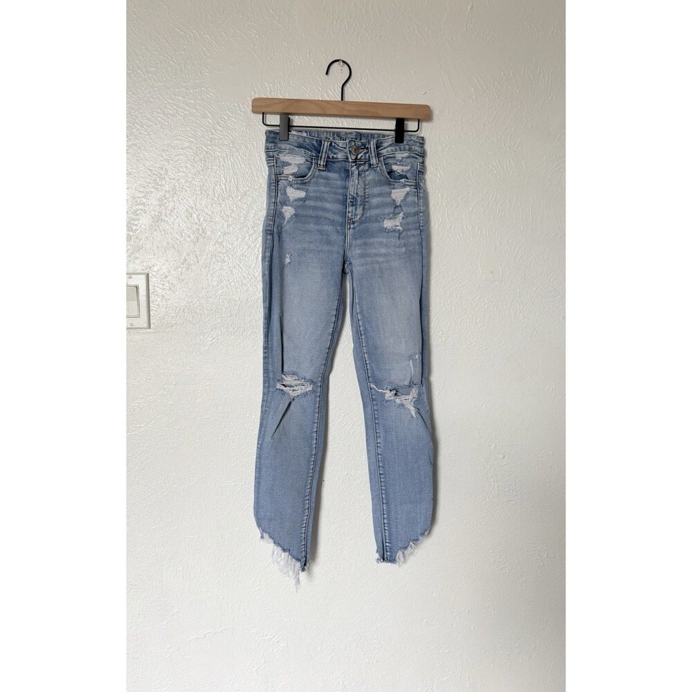 American Eagle Outfitters Next Level Stretch  Light Blue Distressed Jeans Size 4